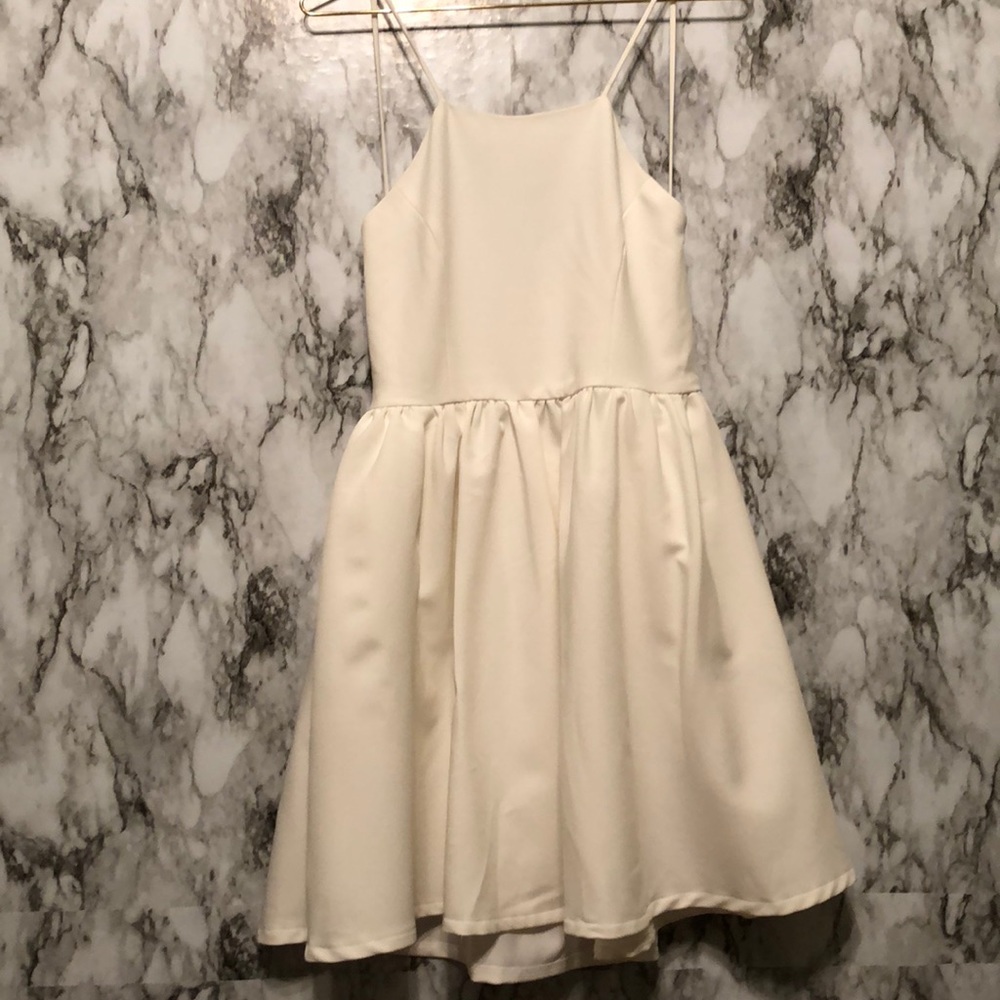 Cream open back flared dress
